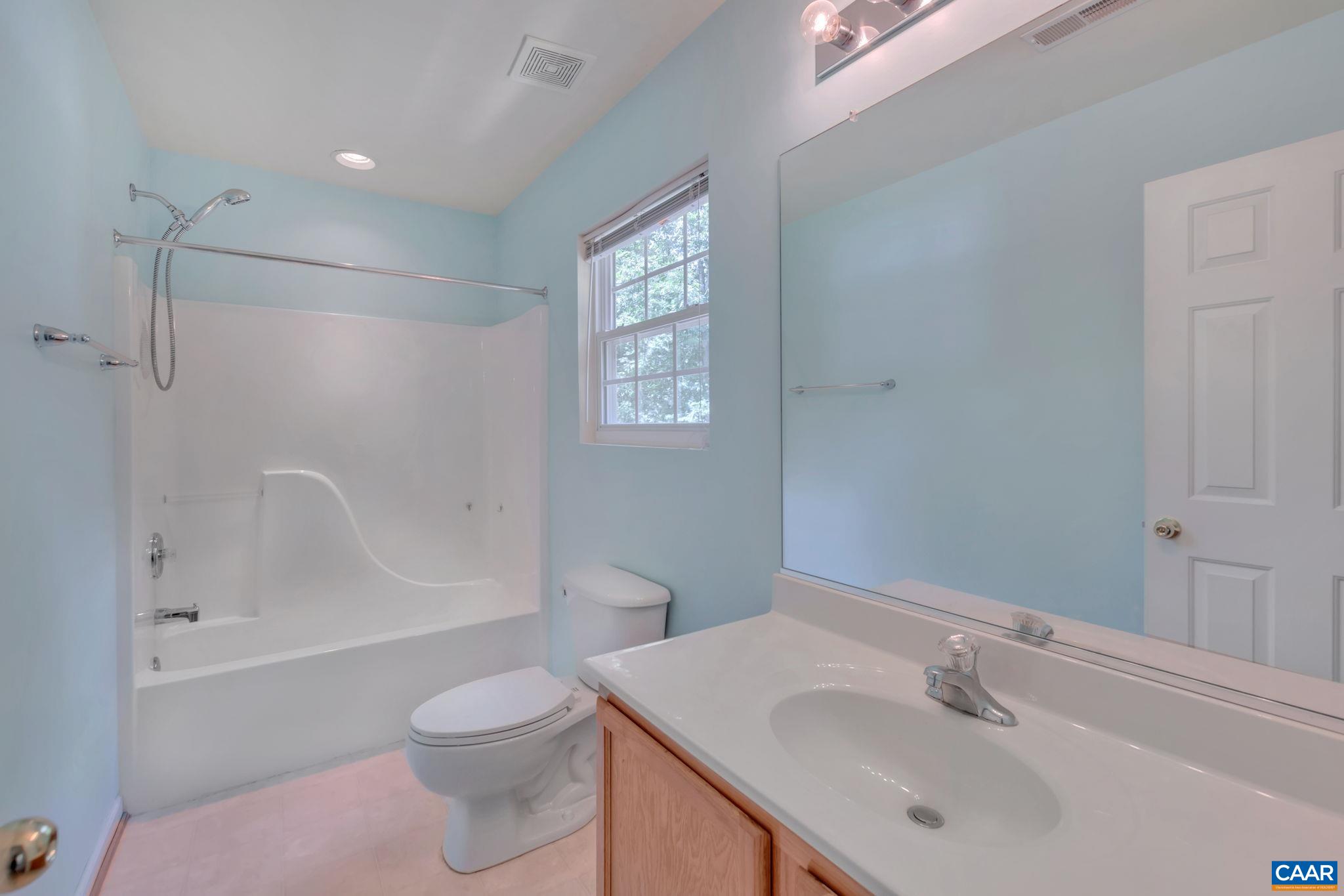 2 Riverside Drive Palmyra, VA 22963 - Photo 20 of 36 a bathroom with a sink toilet tub and shower