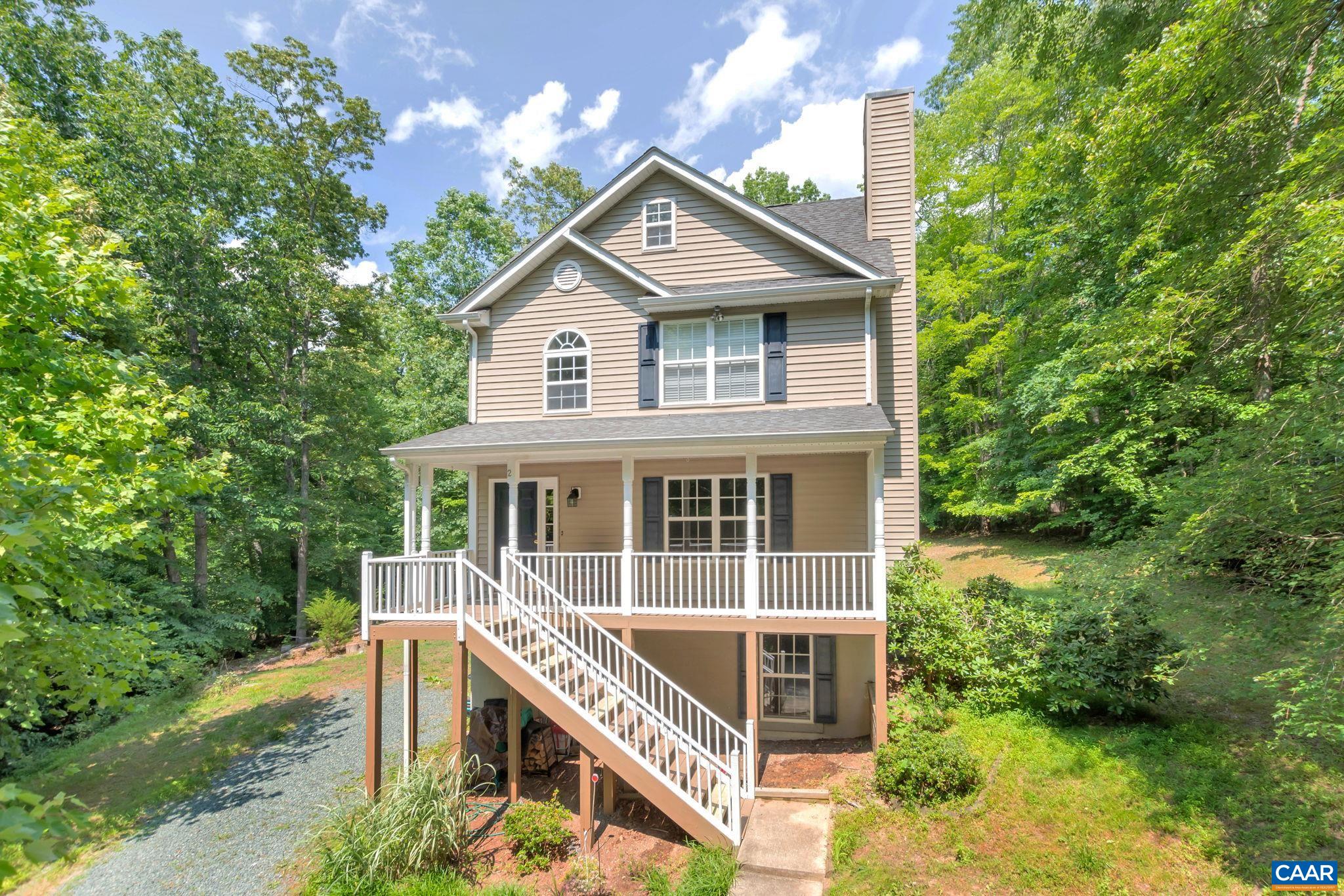 2 Riverside Drive Palmyra, VA 22963 - Photo 2 of 36 a front view of a house with a yard