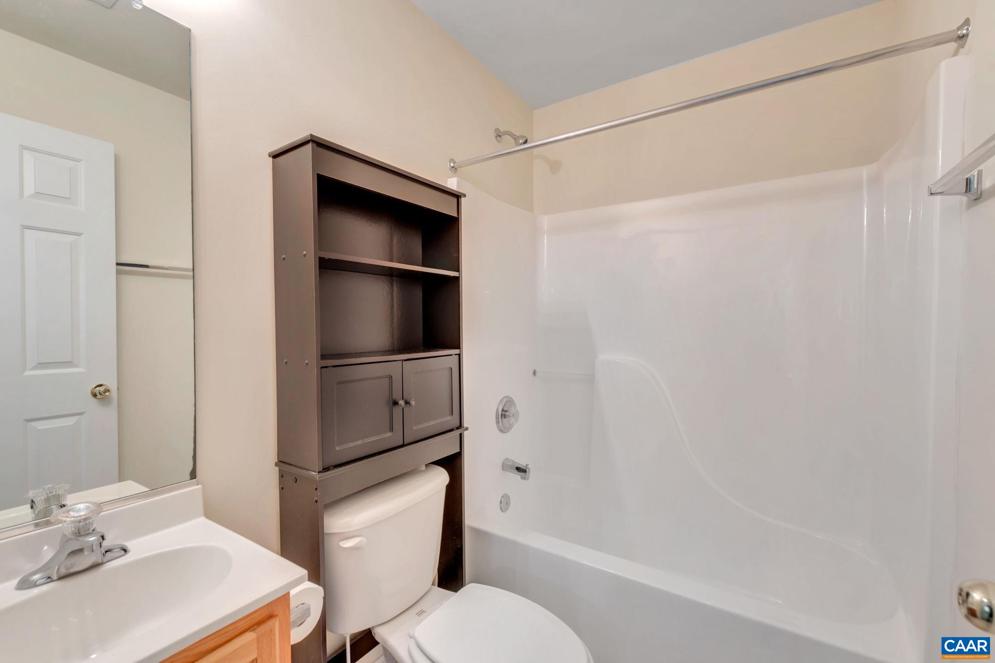 2 Riverside Drive Palmyra, VA 22963 - Photo 25 of 36 a bathroom with a sink toilet and shower