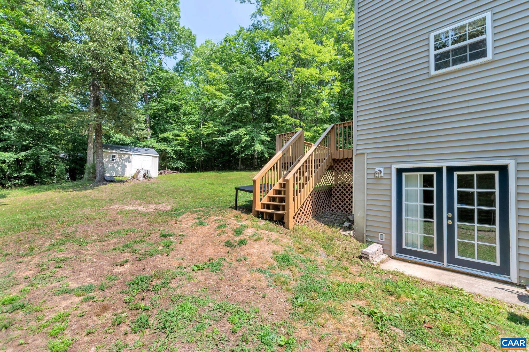 2 Riverside Drive Palmyra, VA 22963 - Photo 27 of 36 a view of a house with backyard and sitting area