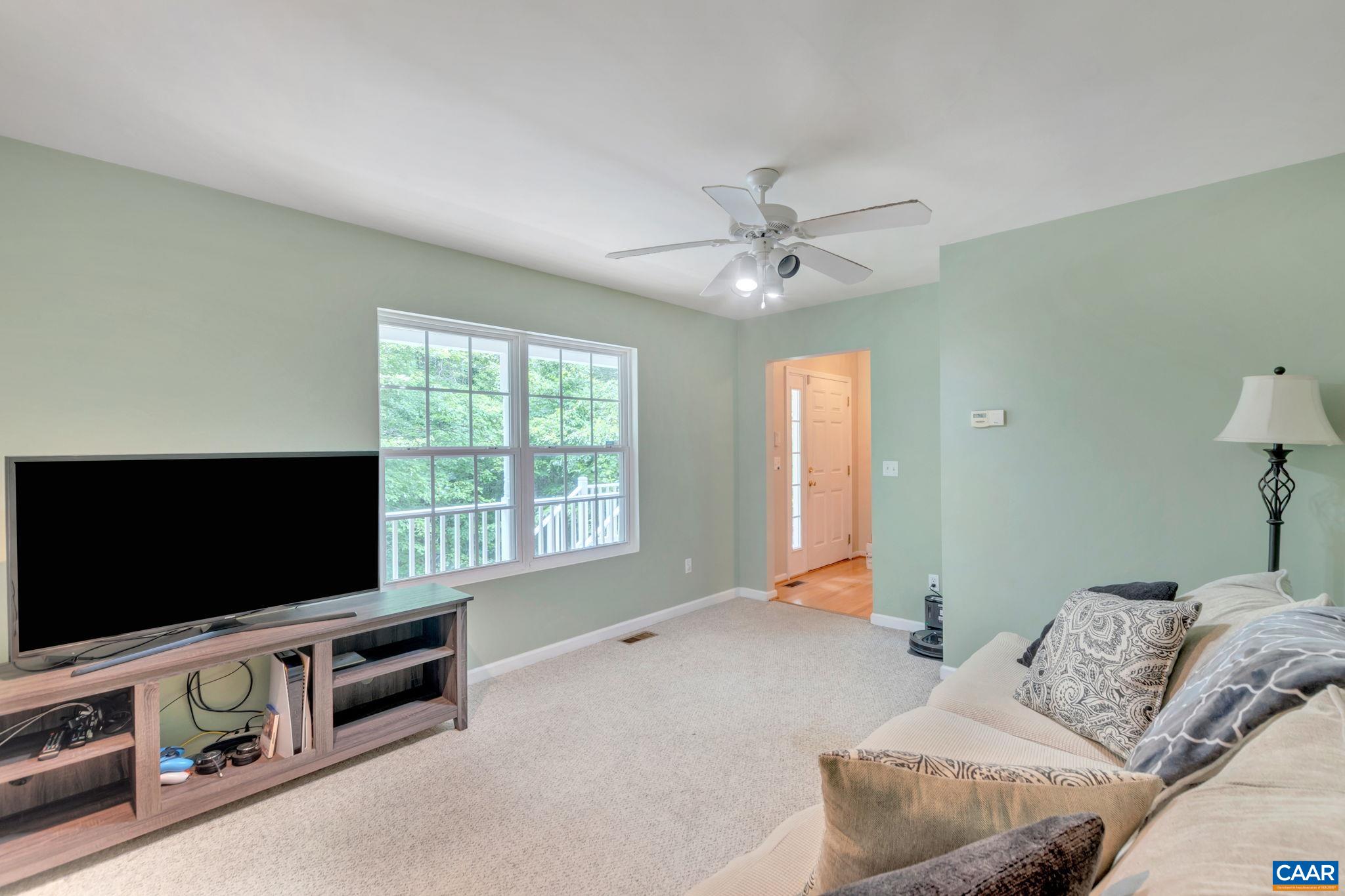 2 Riverside Drive Palmyra, VA 22963 - Photo 7 of 36 a bedroom with furniture and flat screen tv