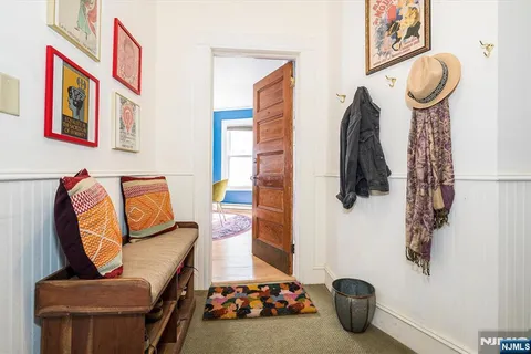 a living room with furniture or couch and a window