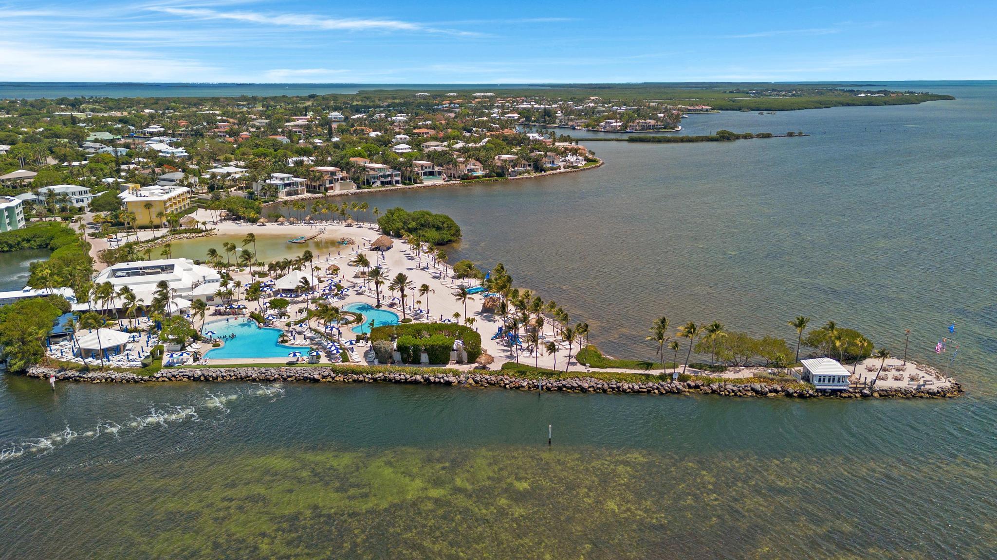 201 Ocean Reef Drive, Unit ES05 Key Largo, FL 33037 - Photo 7 of 8 an aerial view of ocean and residential houses with outdoor space