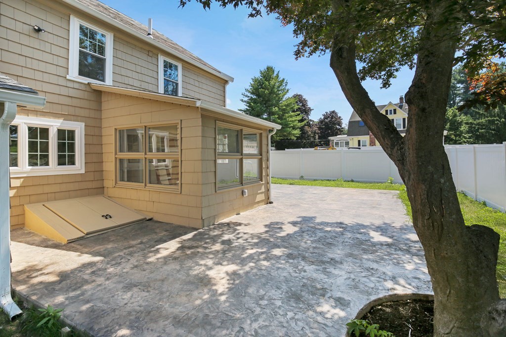 266 Webster Street Worcester, MA 01603 - Photo 11 of 42 a view of a house with a tree in the yard