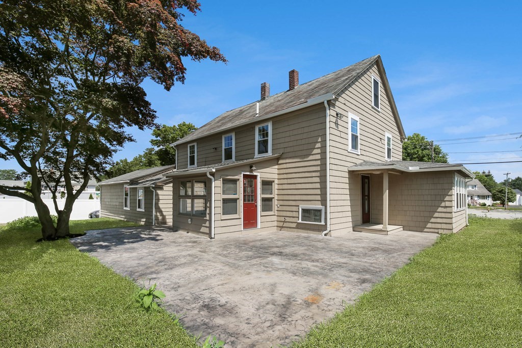 266 Webster Street Worcester, MA 01603 - Photo 12 of 42 front view of a house with a yard