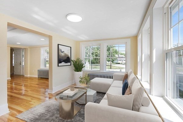 266 Webster Street Worcester, MA 01603 - Photo 2 of 42 a living room with furniture and a large window