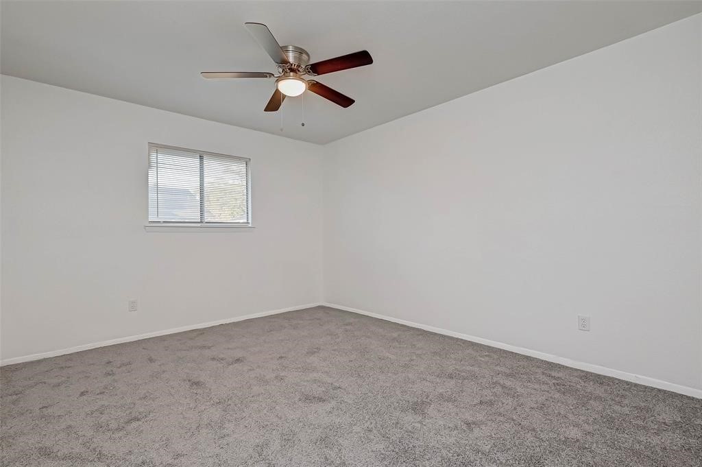 5503 Lynngate Drive Spring, TX 77373 - Photo 13 of 15 an empty room with a window