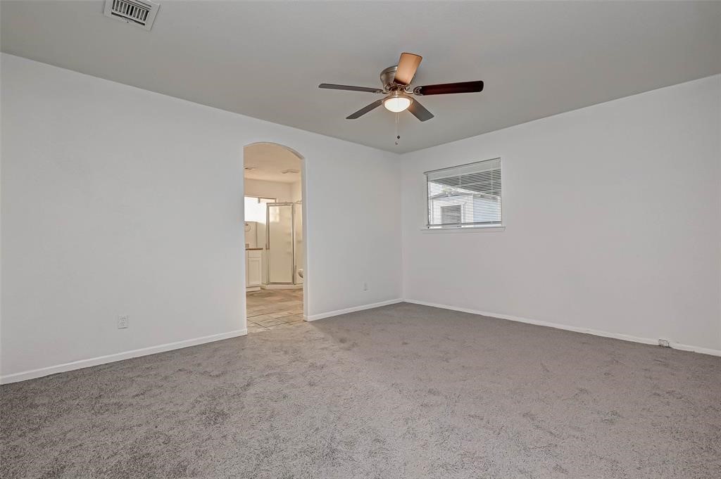 5503 Lynngate Drive Spring, TX 77373 - Photo 14 of 15 a view of empty room with windows