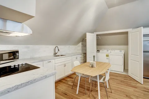 a bed room with a bed and furniture