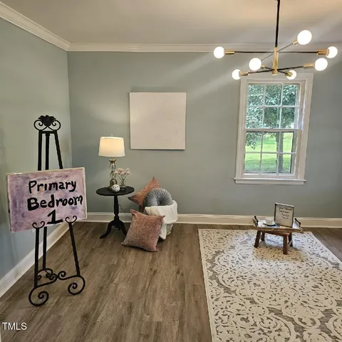 a view of a living room and hardwood