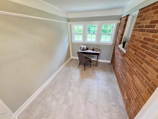 a view of a hallway with staircase