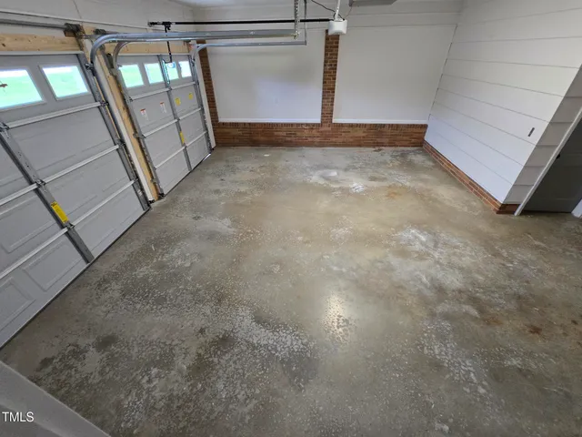 a backyard of a house with seating space