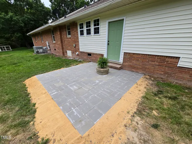 a view of a house with a big yard