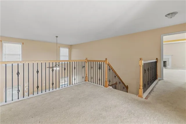a view of a hallway with a window
