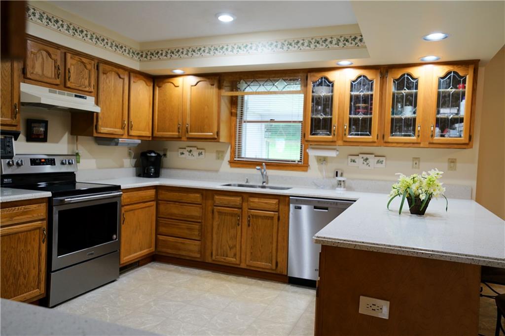 2919 Darlington Road Beaver Falls, PA 15010 - Photo 3 of 25 Truly a greatly designed kitchen for flow, storage, prep space and light. Corian hard surface counters