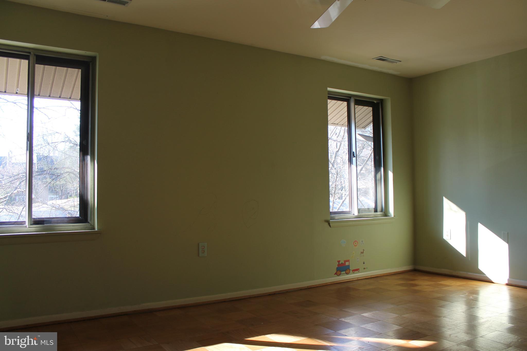 112 Cross Keys Road, Unit R112E Baltimore, MD 21210 - Photo 10 of 19 Bedroom windows face west for afternoon light