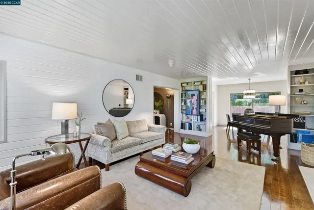a kitchen with a stove top oven and white appliances
