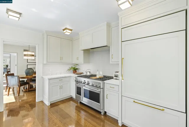 a living room with furniture and a walk in closet
