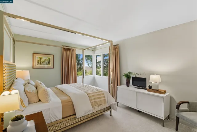 a view of a backyard with swimming pool