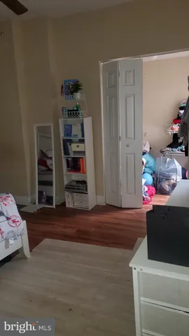 a room with toys and a book shelf