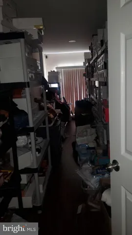 a view of storage and utility room