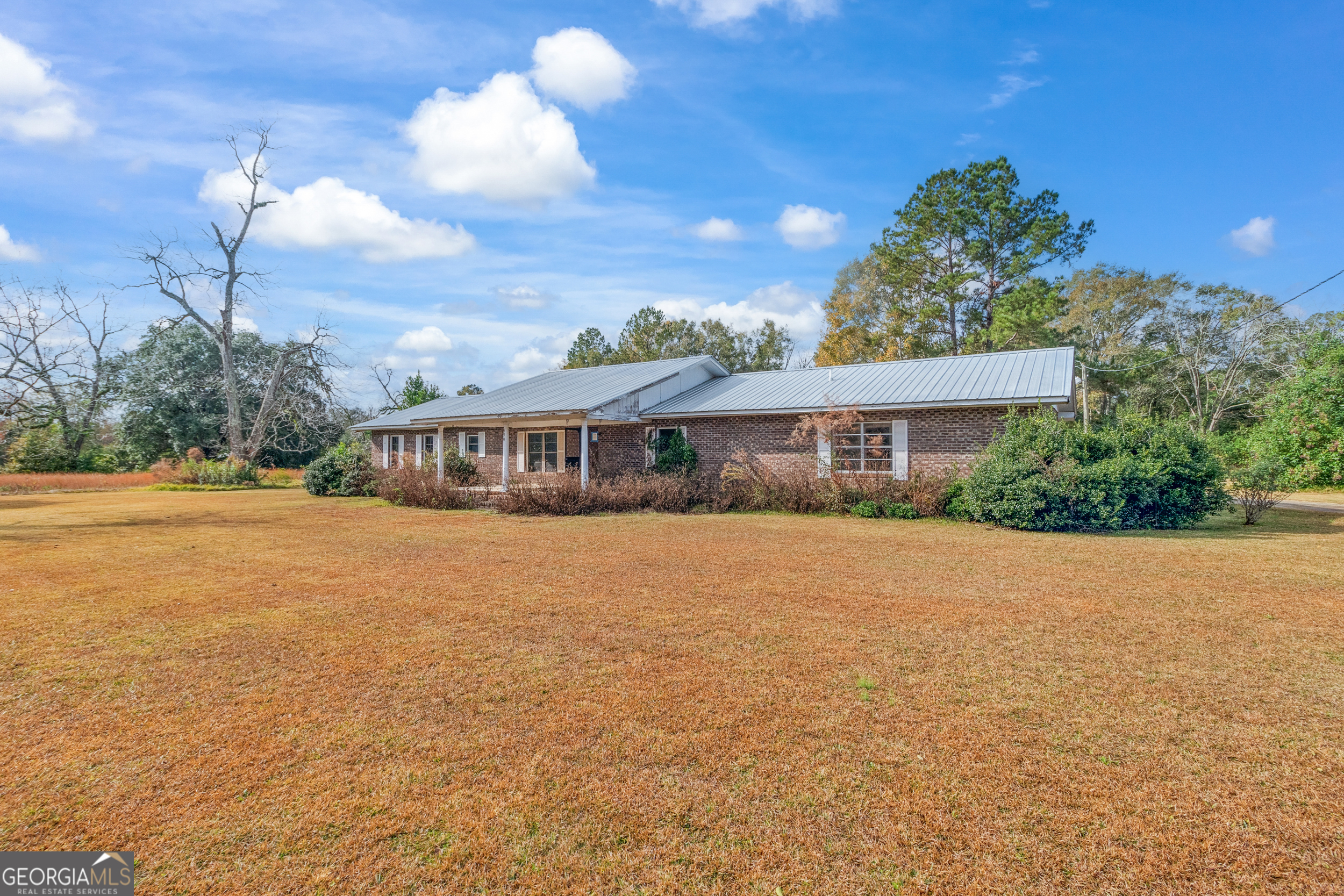 490 13th Street Southwest Cairo, GA 39828 - Photo 1 of 1 a front view of a house with a yard