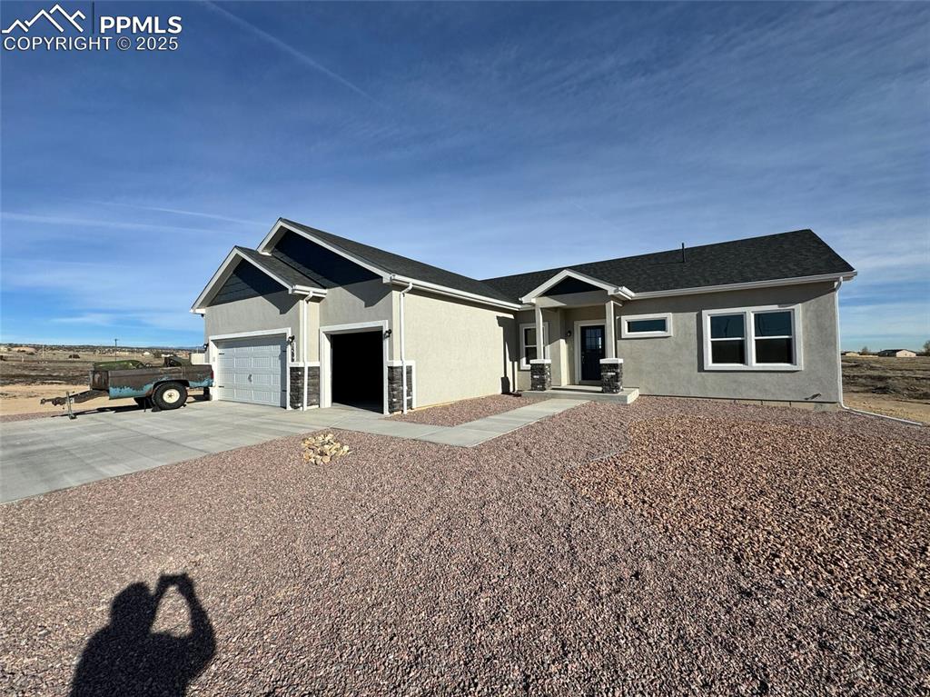 3955 Yoder Road Yoder, CO 80864 - Photo 1 of 27 View of front of property featuring a garage