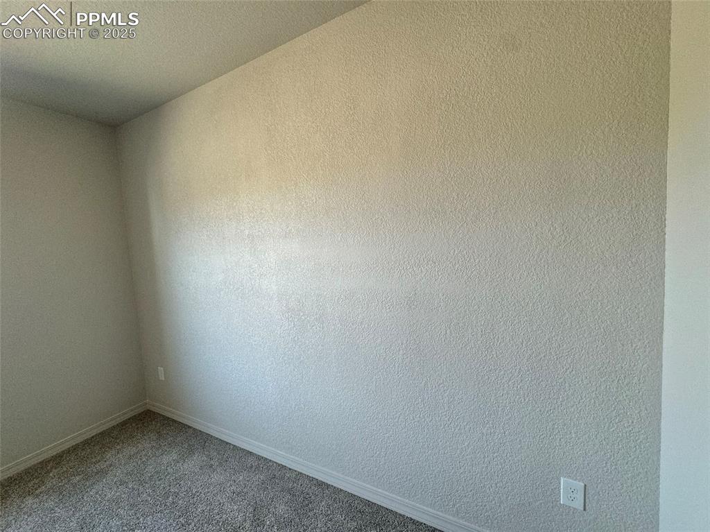 3955 Yoder Road Yoder, CO 80864 - Photo 14 of 27 Unfurnished room featuring carpet