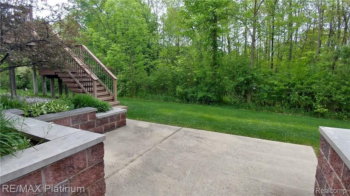 4120 Merriman Loop Howell, MI 48843 - Photo 33 of 34 Backs to Woods