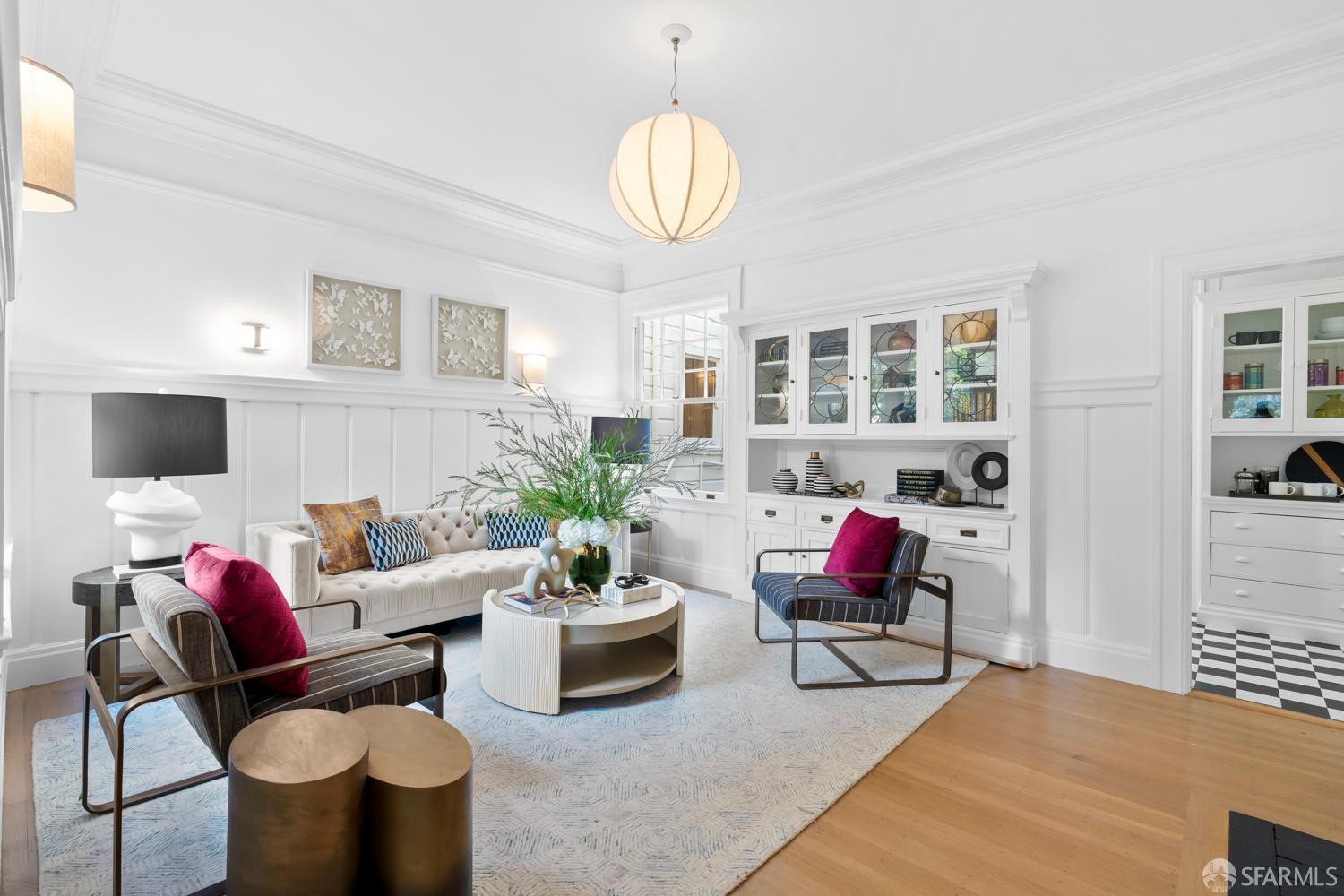 2650 Union Street San Francisco, CA 94123 - Photo 7 of 14 a living room with furniture and a chandelier
