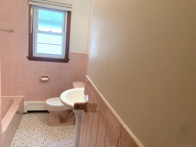 a bathroom with a toilet
