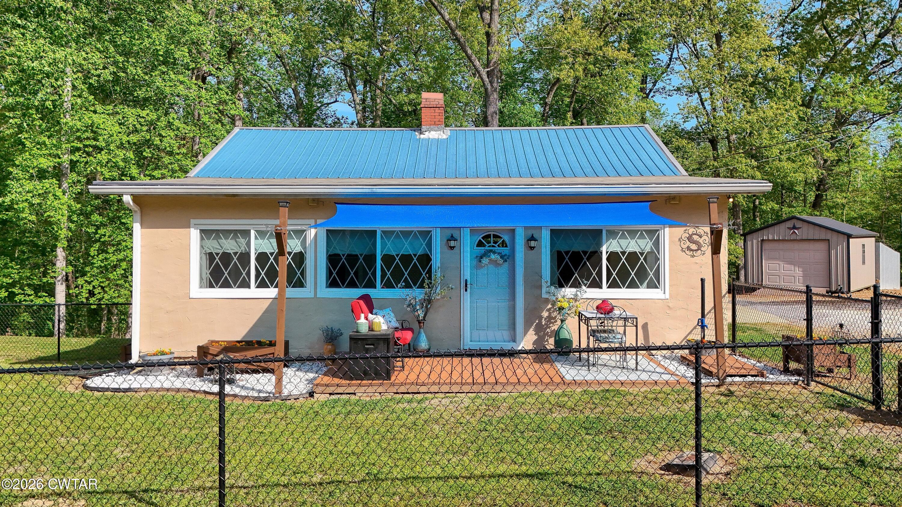 a front view of house with yard