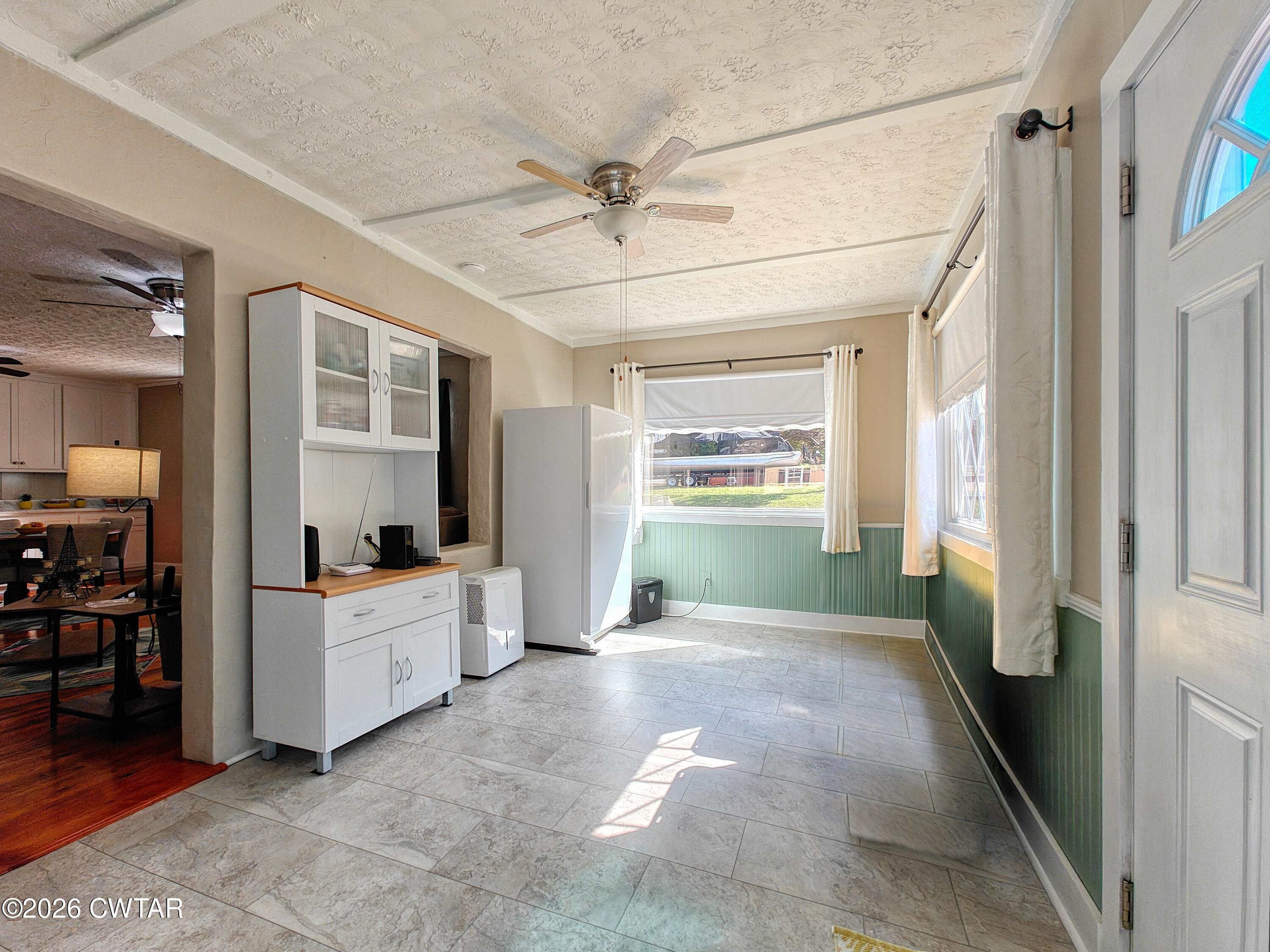 195 Coast Guard Road Buchanan, TN 38222 - Photo 27 of 34 a view of a room with workspace and a window