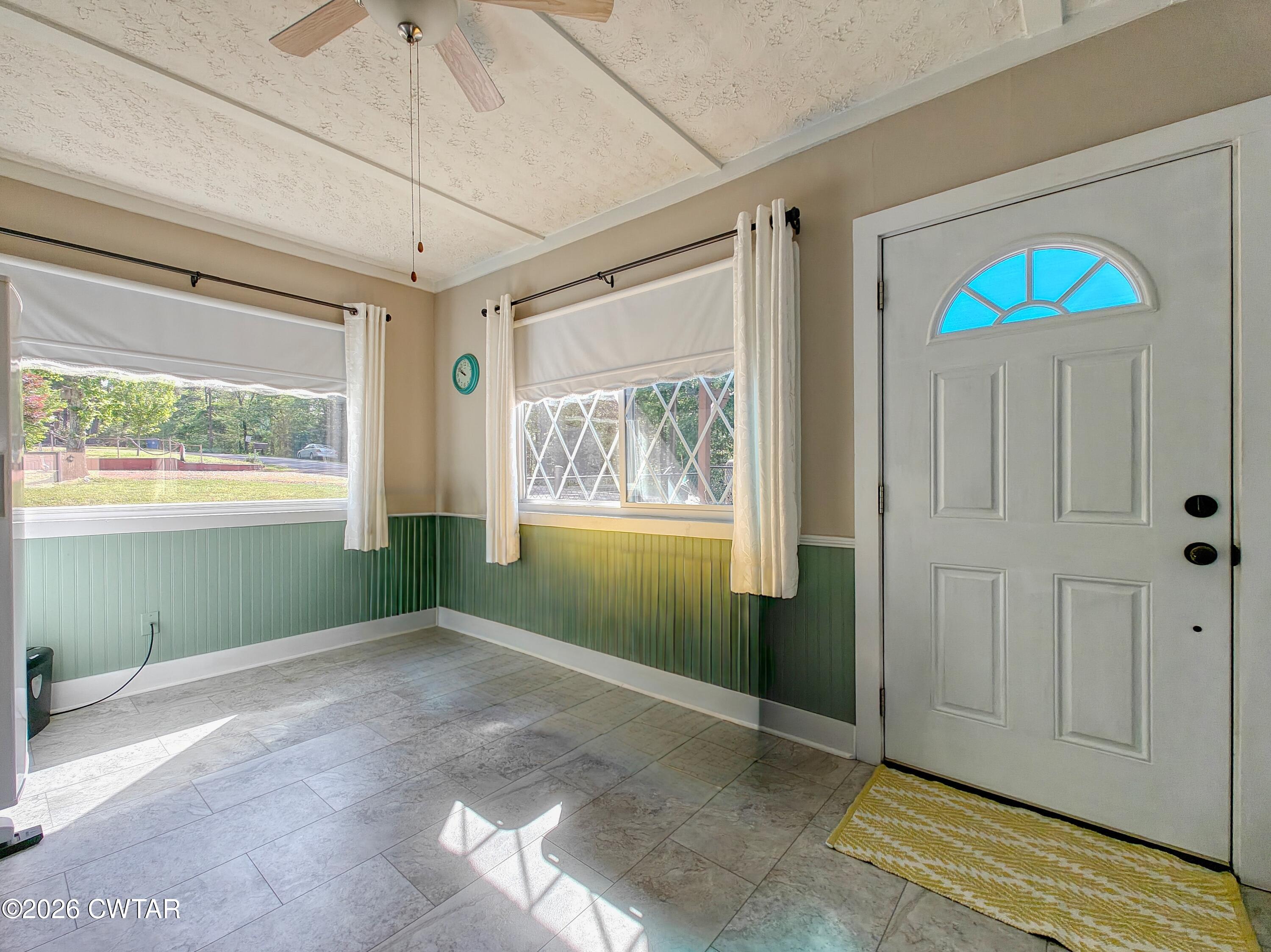 195 Coast Guard Road Buchanan, TN 38222 - Photo 28 of 34 a view of empty room with window and ceiling fan