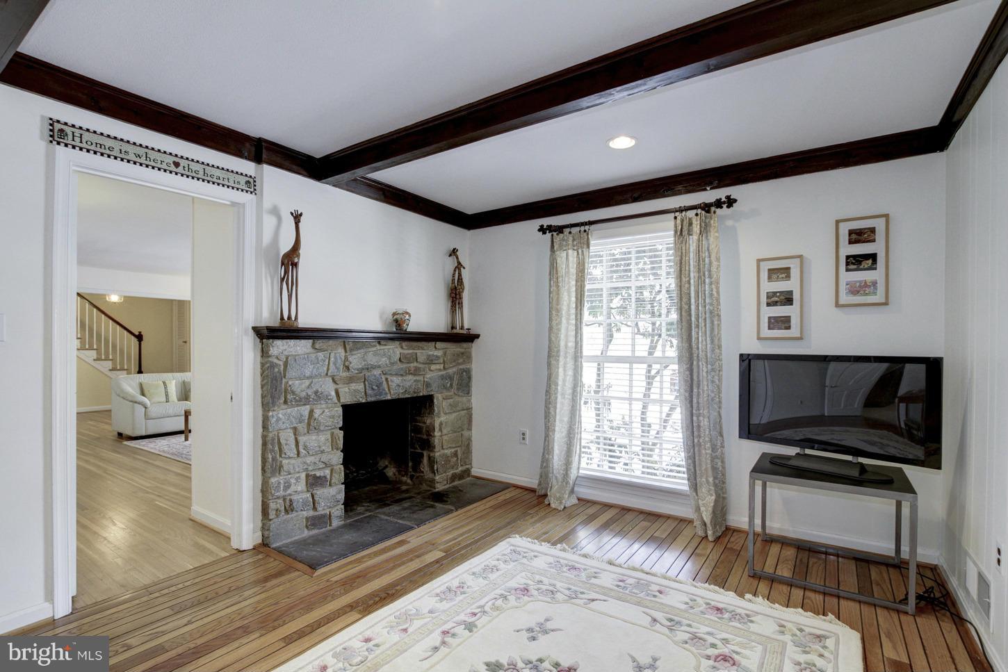 13308 Old Forge Road Silver Spring, MD 20904 - Photo 14 of 30 Family Room with HWF & Stone Fireplace
