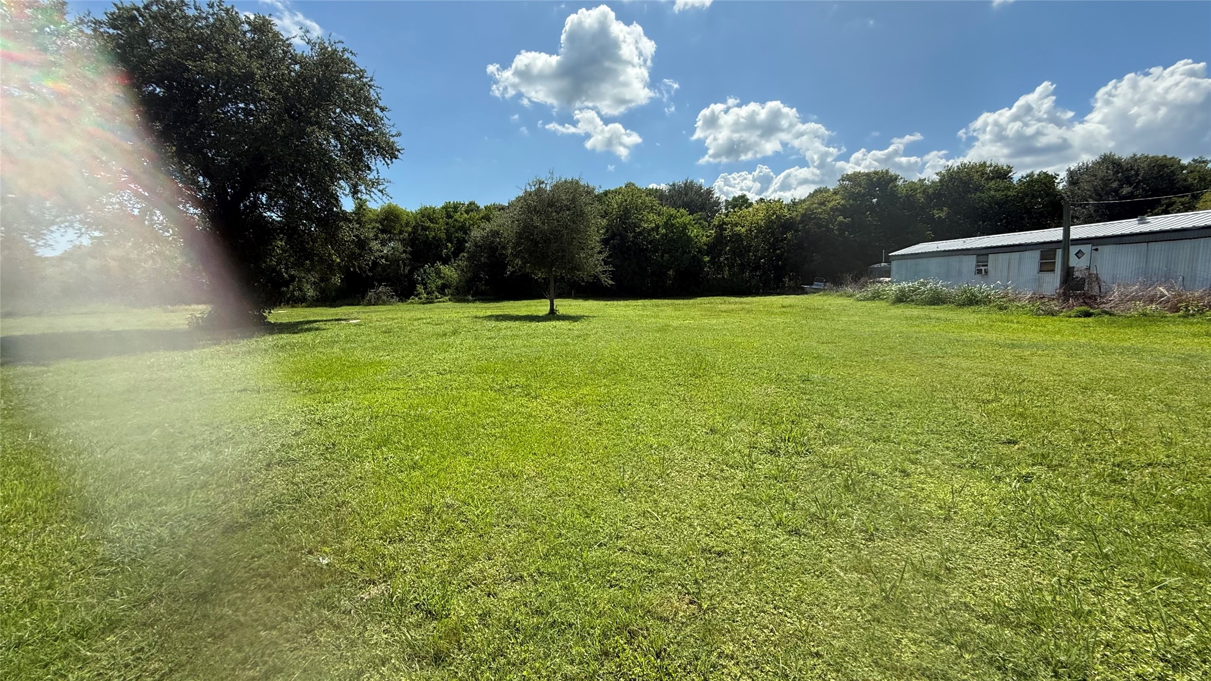 5 Weeks Avenue High Island, TX 77623 - Photo 3 of 6 a view of a golf course with a tree