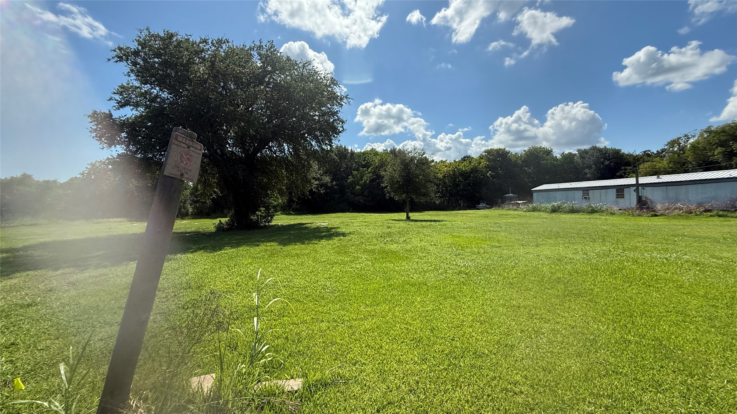 5 Weeks Avenue High Island, TX 77623 - Photo 4 of 6 a view of a golf course with a lake
