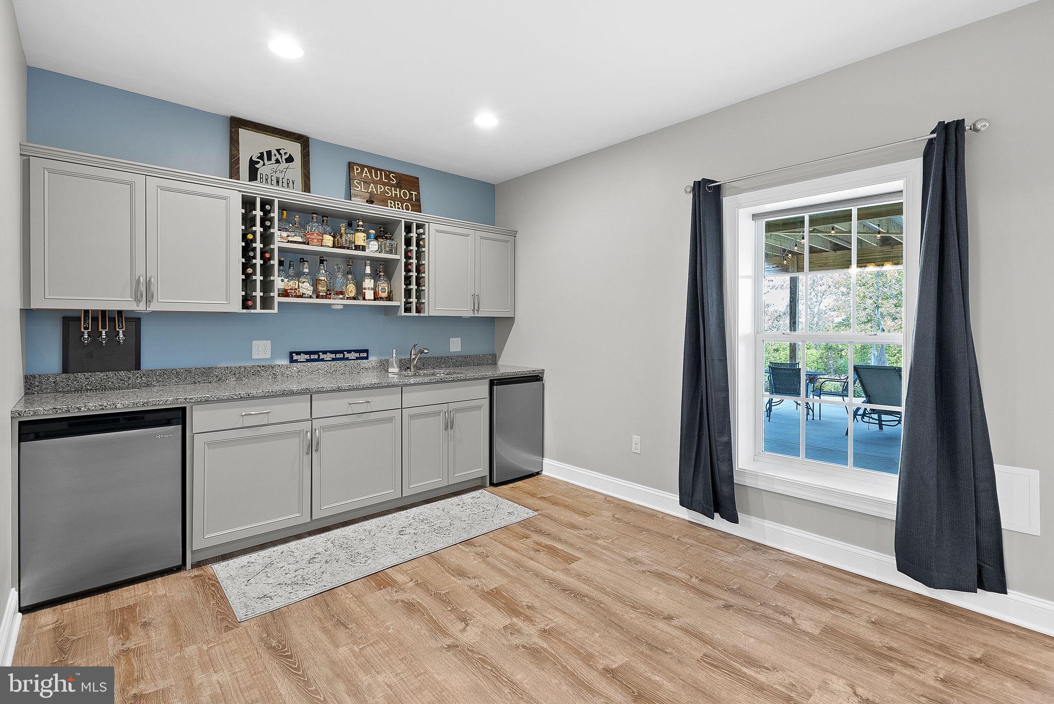 18604 Wild Raspberry Drive Purcellville, VA 20132 - Photo 22 of 44 Lower level wet bar