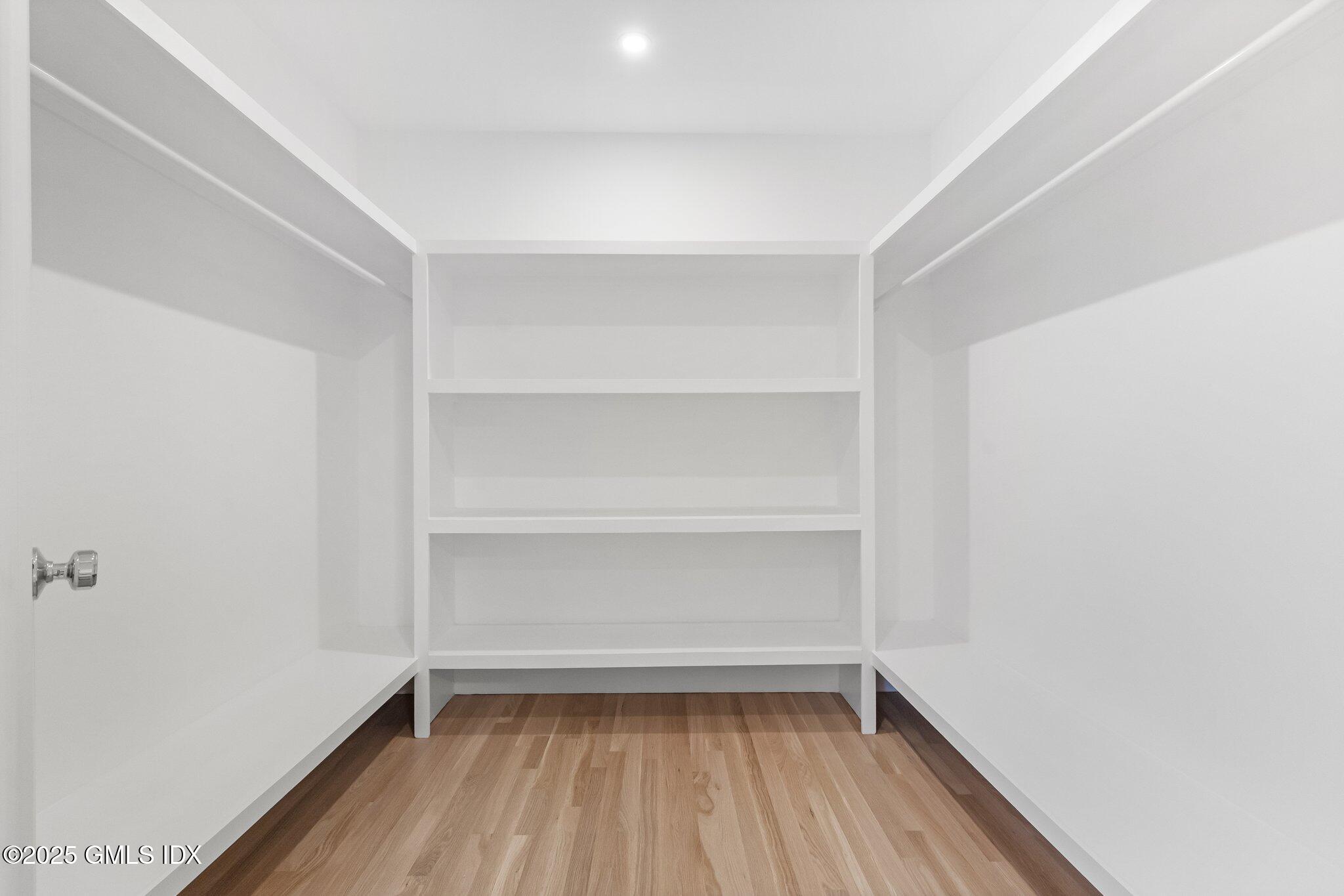 8 Pintail Lane Greenwich, CT 06830 - Photo 17 of 37 a view of an empty walk in closet