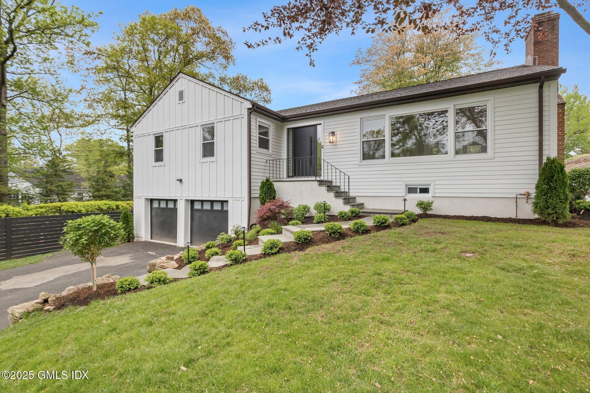 8 Pintail Lane Greenwich, CT 06830 - Photo 2 of 37 a view of a house with a yard