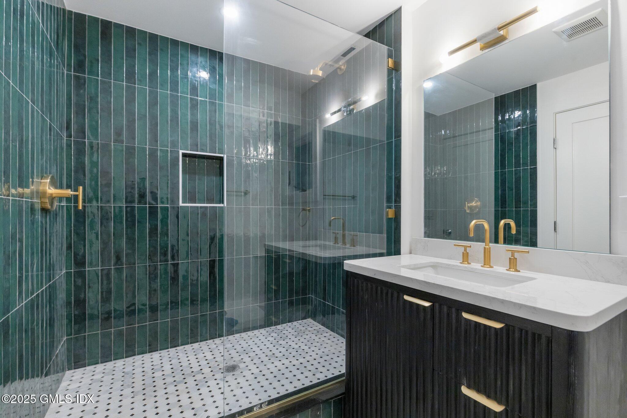 8 Pintail Lane Greenwich, CT 06830 - Photo 30 of 37 a bathroom with a sink a toilet and shower