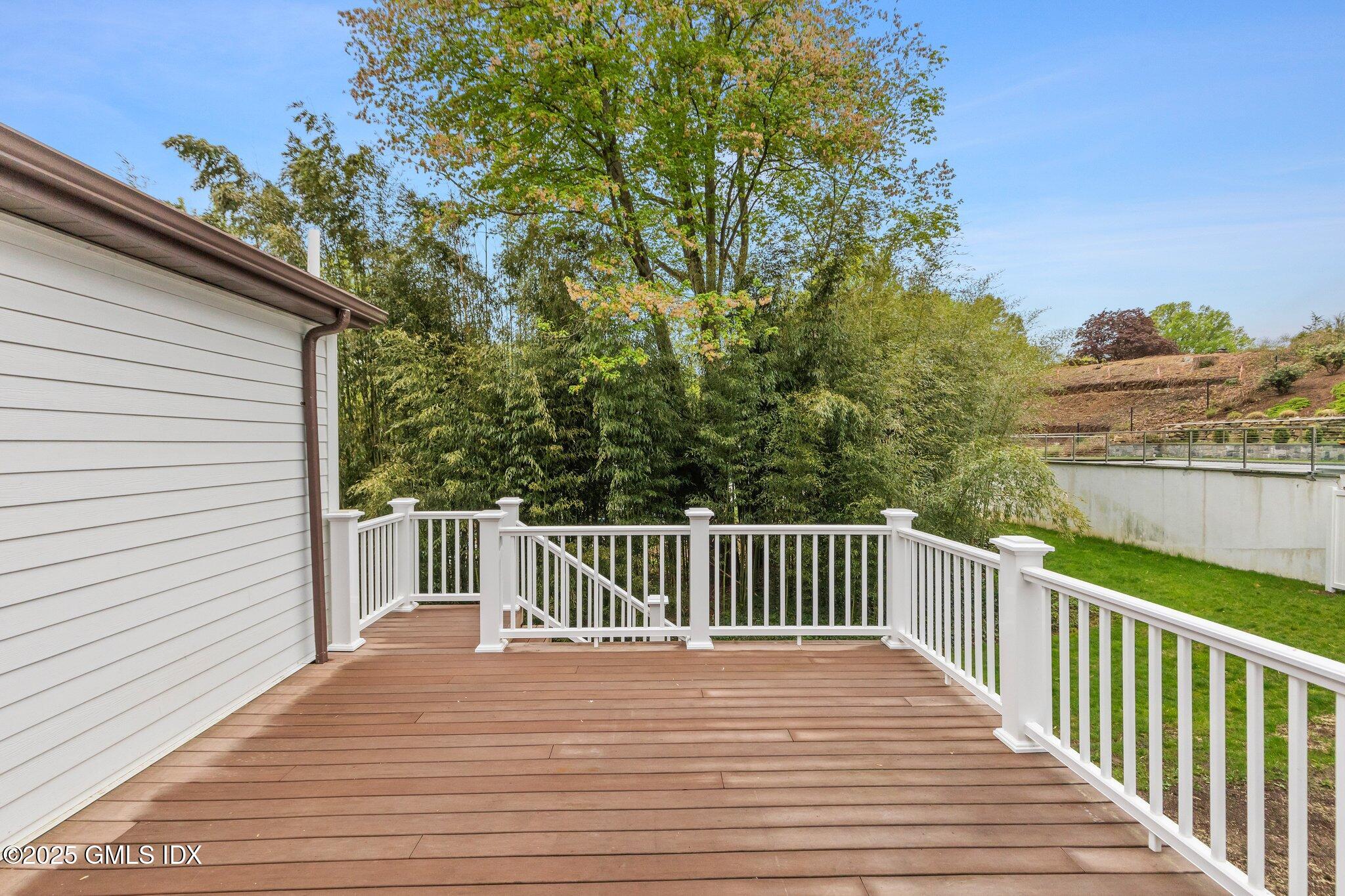8 Pintail Lane Greenwich, CT 06830 - Photo 34 of 37 a terrace with trees in front of it