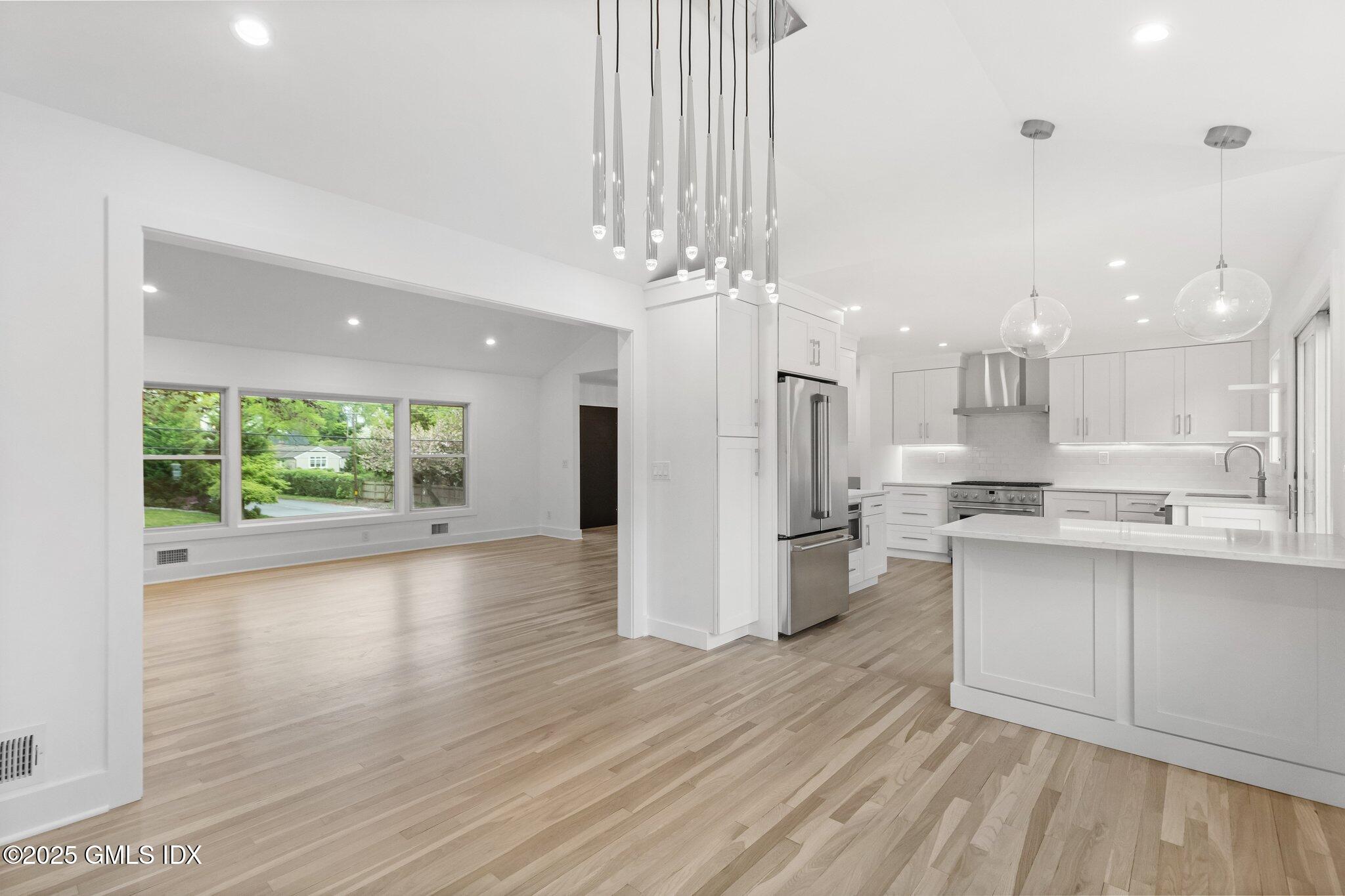 8 Pintail Lane Greenwich, CT 06830 - Photo 8 of 37 a view of a kitchen with a sink and a large window