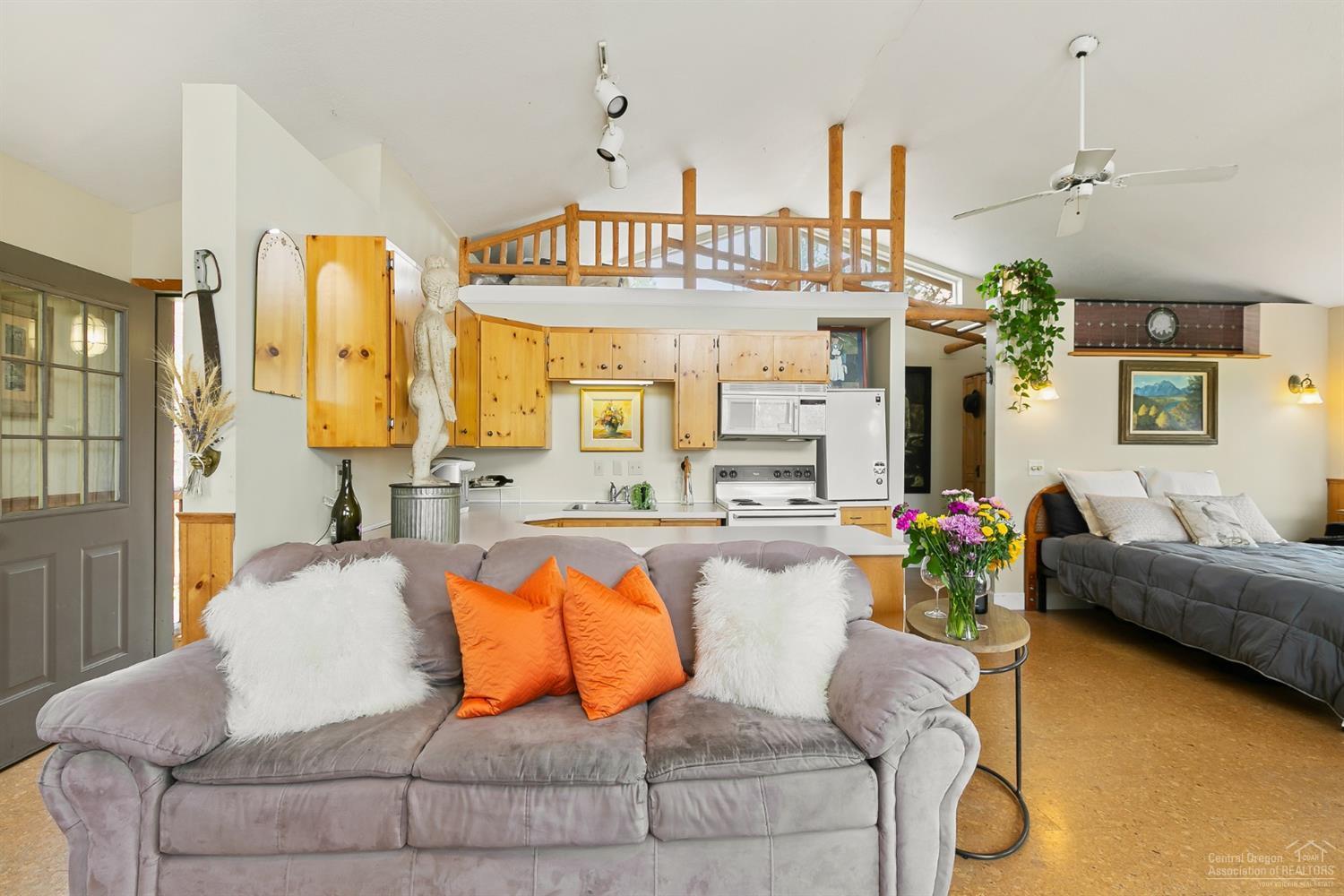 19005 Couch Market Road Bend, OR 97703 - Photo 10 of 22 a living room with furniture and wooden floor