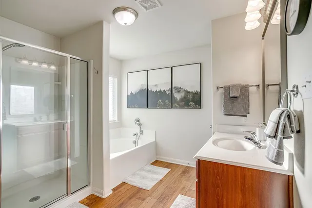a bathroom with a sink and a bathtub