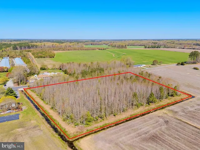 a view of swimming pool with a balcony