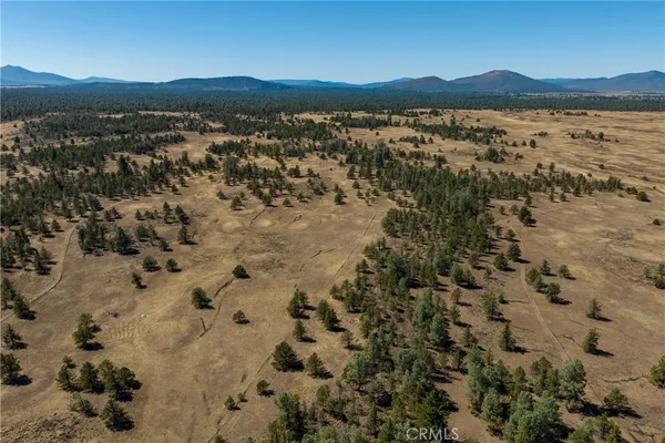 a view of a lake with mountains in the background