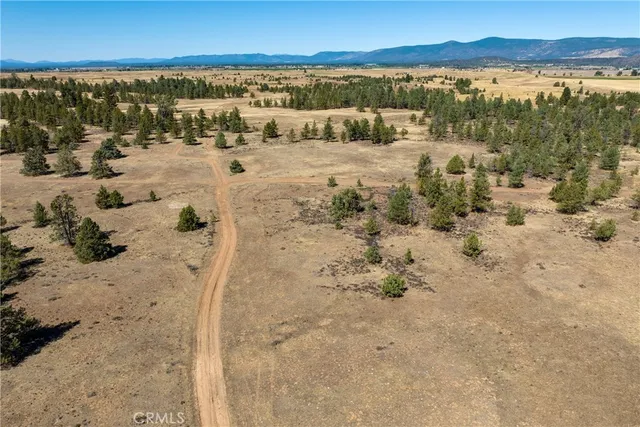 a view of a lake with mountains in the background