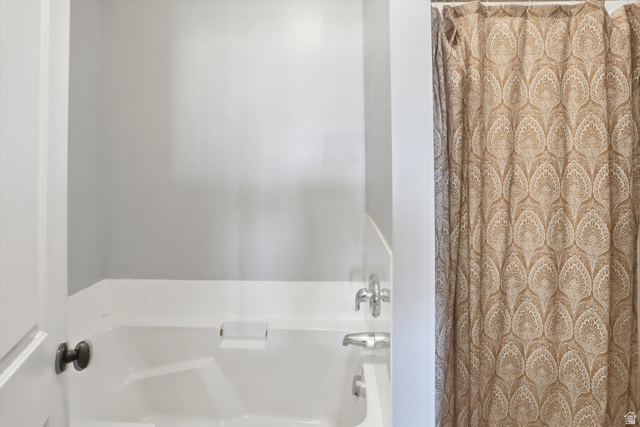 14820 175 East Draper, UT 84020 - Photo 14 of 39 Bathroom with a bathtub and curtained shower