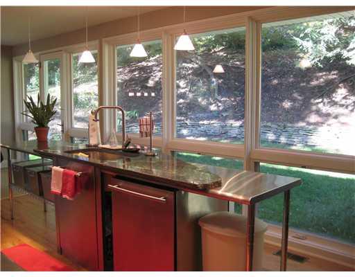 299 Buckingham Road Fox Chapel, PA 15215 - Photo 4 of 16 Kitchen. Walls of windows from kitchen to private view of rear yard!